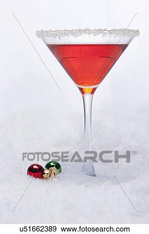USA, Illinois, Metamora, drink in martini glass on snow View Large Photo Image Stock Photo - USA, Illinois, Metamora, drink in martini glass on snow. Fotosearch