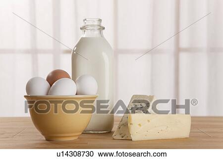 USA, Illinois, Metamora, Eggs, cheese and milk bottle on table View Large Photo Image Stock Image - USA, Illinois, Metamora, Eggs, cheese and milk bottle on table. Fotosearch