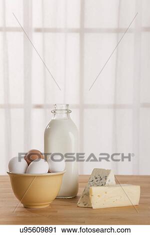USA, Illinois, Metamora, Eggs, cheese and milk bottle on table View Large Photo Image Stock Image - USA, Illinois, Metamora, Eggs, cheese and milk bottle on table. Fotosearch