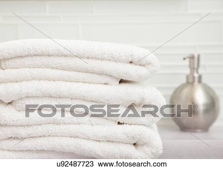 USA, Illinois, Metamora, focus on stack of towels in bathroom View Large Photo Image Stock Image - USA, Illinois, Metamora, focus on stack of towels in bathroom. Fotosearch