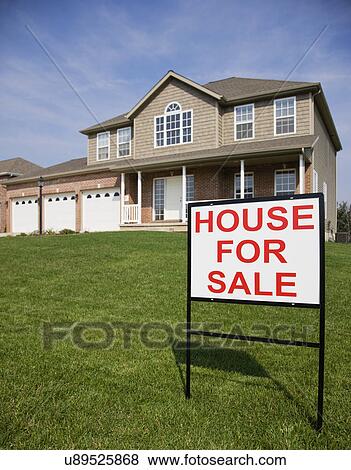 USA, Illinois, Metamora, For sale sign in front of house View Large Photo Image Stock Photo - USA, Illinois, Metamora, For sale sign in front of house. Fotosearch