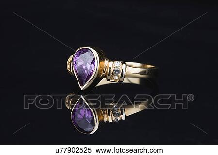 USA, Illinois, Metamora, Gemstone ring on black background View Large Photo Image Stock Photography - USA, Illinois, Metamora, Gemstone ring on black background. Fotosearch