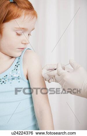 USA, Illinois, Metamora, Girl (4-5) having vaccination in doctor' office View Large Photo Image Stock Photograph - USA, Illinois, Metamora, Girl (4-5) having vaccination in doctor' office. Fotosearch