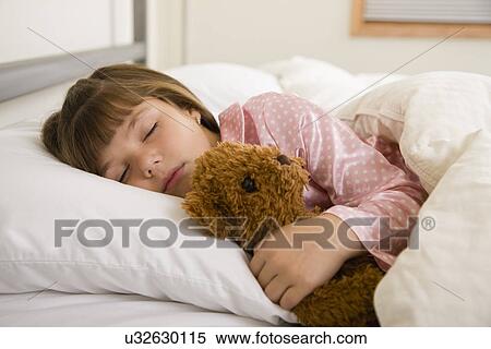 USA, Illinois, Metamora, Girl (6-7) sleeping with teddy bear View Large Photo Image Stock Photography - USA, Illinois, Metamora, Girl (6-7) sleeping with teddy bear. Fotosearch