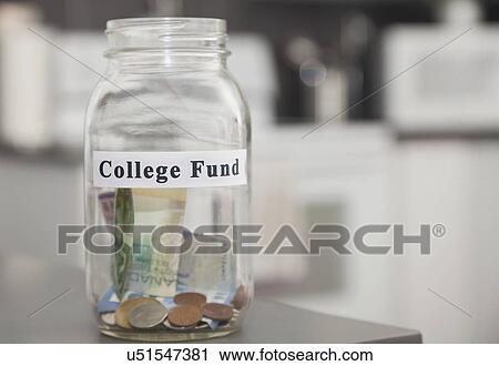 USA, Illinois, Metamora, Glass jar with coins on kitchen counter View Large Photo Image Stock Image - USA, Illinois, Metamora, Glass jar with coins on kitchen counter. Fotosearch