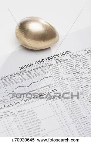 USA, Illinois, Metamora, Golden egg on newspaper stock quotes View Large Photo Image Stock Photography - USA, Illinois, Metamora, Golden egg on newspaper stock quotes. Fotosearch