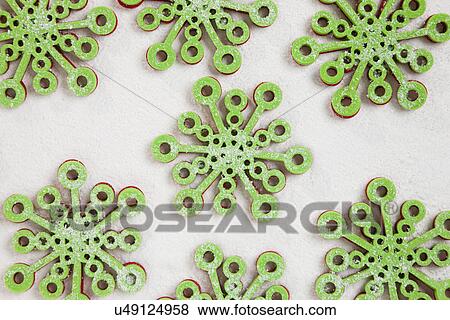 USA, Illinois, Metamora, green Christmas decoration on snow View Large Photo Image Stock Photo - USA, Illinois, Metamora, green Christmas decoration on snow. Fotosearch