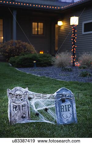 Stock Photo - USA, Illinois, Metamora, Halloween decoration in front of house. Fotosearch