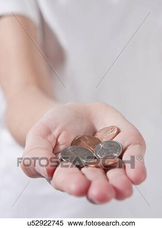 USA, Illinois, Metamora, Hand holding US coins View Large Photo Image Stock Photography - USA, Illinois, Metamora, Hand holding US coins. Fotosearch