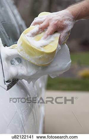 USA, Illinois, Metamora, Hand washing rearview mirror View Large Photo Image Stock Image - USA, Illinois, Metamora, Hand washing rearview mirror. Fotosearch