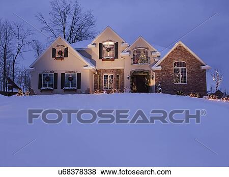 USA, Illinois, Metamora, house decorated with Christmas lights at dusk View Large Photo Image Stock Photo - USA, Illinois, Metamora, house decorated with Christmas lights at dusk. Fotosearch