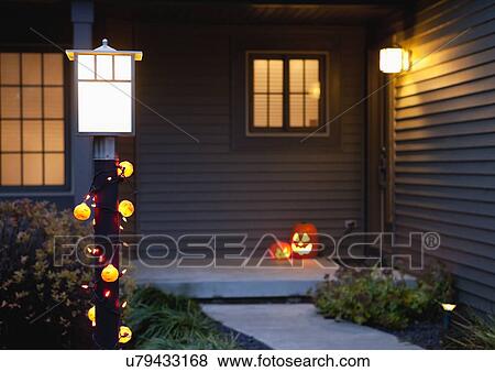 Stock Photo - USA, Illinois, Metamora, House decorated for Halloween. Fotosearch