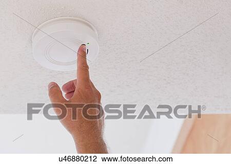USA, Illinois, Metamora, Human hand touching smoke detector View Large Photo Image Stock Image - USA, Illinois, Metamora, Human hand touching smoke detector. Fotosearch