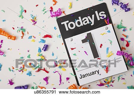 Stock Image - USA, Illinois, Metamora, January 1 calendar with confetti. Fotosearch
