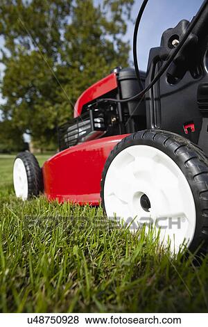 USA, Illinois, Metamora, Lawn mower, close-up View Large Photo Image Stock Photo - USA, Illinois, Metamora, Lawn mower, close-up. Fotosearch