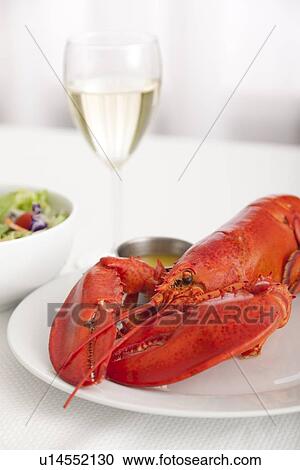 Stock Image - USA, Illinois, Metamora, Lobster on plate. Fotosearch