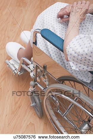 Stock Photograph - USA, Illinois, Metamora, Low section of senior woman in wheelchair. Fotosearch