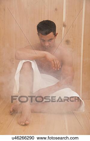 USA, Illinois, Metamora, Man sitting in sauna View Large Photo Image Stock Image - USA, Illinois, Metamora, Man sitting in sauna. Fotosearch