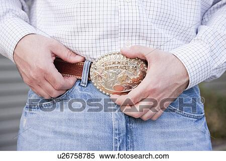 USA, Illinois, Metamora, Man wearing jeans and ornate belt, mid section View Large Photo Image Stock Photography - USA, Illinois, Metamora, Man wearing jeans and ornate belt, mid section. Fotosearch