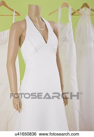 USA, Illinois, Metamora, Mannequin displaying white dress View Large Photo Image Stock Photograph - USA, Illinois, Metamora, Mannequin displaying white dress. Fotosearch