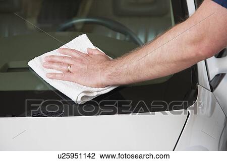 USA, Illinois, Metamora, Man's hand cleaning car's windshield, close-up View Large Photo Image Stock Image - USA, Illinois, Metamora, Man's hand cleaning car's windshield, close-up. Fotosearch