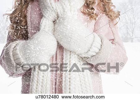 USA, Illinois, Metamora, midsection of girl (8-9) wearing gloves and scarf View Large Photo Image Stock Image - USA, Illinois, Metamora, midsection of girl (8-9) wearing gloves and scarf. Fotosearch