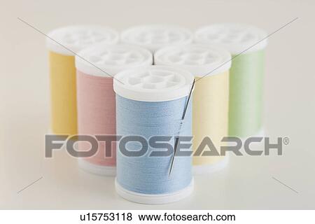 USA, Illinois, Metamora, multi colored thread spools View Large Photo Image Stock Photo - USA, Illinois, Metamora, multi colored thread spools. Fotosearch