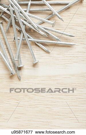 USA, Illinois, Metamora, Nails on wood View Large Photo Image Stock Photo - USA, Illinois, Metamora, Nails on wood. Fotosearch