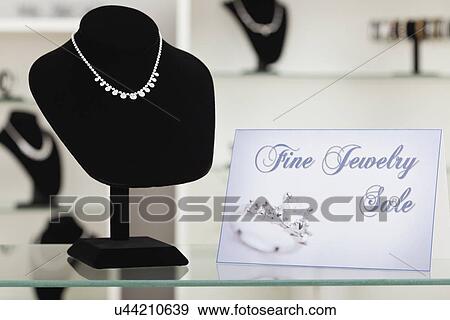 USA, Illinois, Metamora, necklace on display in jewelry store View Large Photo Image Stock Photo - USA, Illinois, Metamora, necklace on display in jewelry store. Fotosearch