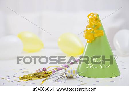 USA, Illinois, Metamora, New Year's hat and noisemakers View Large Photo Image Stock Image - USA, Illinois, Metamora, New Year's hat and noisemakers. Fotosearch
