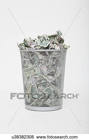 USA, Illinois, Metamora, Pile of money in trashcan View Large Photo Image Stock Photo - USA, Illinois, Metamora, Pile of money in trashcan. Fotosearch