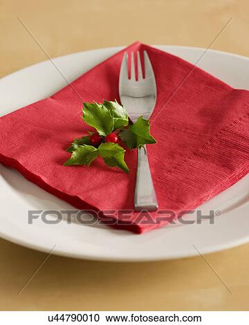 USA, Illinois, Metamora, Plate with red napkin, fork and holly on table View Large Photo Image Stock Image - USA, Illinois, Metamora, Plate with red napkin, fork and holly on table. Fotosearch