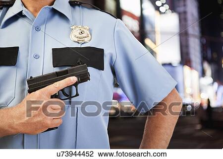 USA, Illinois, Metamora, Police officer aiming gun View Large Photo Image Stock Image - USA, Illinois, Metamora, Police officer aiming gun. Fotosearch