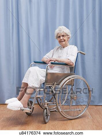 USA, Illinois, Metamora, Portrait of senior woman in wheelchair View Large Photo Image Picture - USA, Illinois, Metamora, Portrait of senior woman in wheelchair. Fotosearch