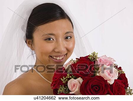 USA, Illinois, Metamora, Portrait of bride with bouquet View Large Photo Image Stock Image - USA, Illinois, Metamora, Portrait of bride with bouquet. Fotosearch