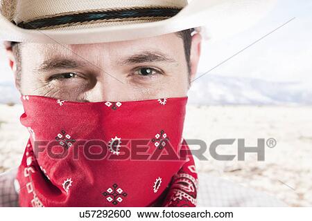 USA, Illinois, Metamora, Portrait of cowboy covering his face with bandana View Large Photo Image Stock Image - USA, Illinois, Metamora, Portrait of cowboy covering his face with bandana. Fotosearch