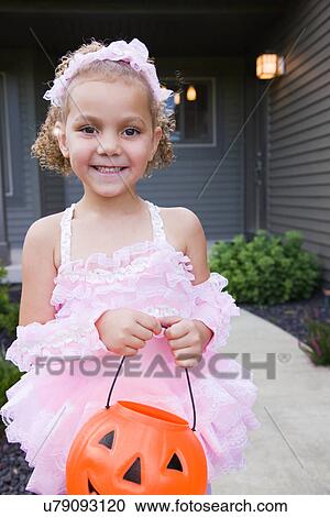 USA, Illinois, Metamora, Portrait of girl (6-7) in Halloween costume View Large Photo Image Stock Image - USA, Illinois, Metamora, Portrait of girl (6-7) in Halloween costume. Fotosearch