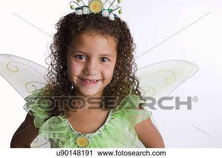 USA, Illinois, Metamora, Portrait of girl (8-9) in fairy costume View Large Photo Image Stock Image - USA, Illinois, Metamora, Portrait of girl (8-9) in fairy costume. Fotosearch
