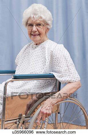 Stock Photograph - USA, Illinois, Metamora, Portrait of senior woman in wheelchair. Fotosearch