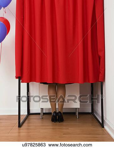 USA, Illinois, Metamora, Rear view of woman's legs in voting booth View Large Photo Image Stock Image - USA, Illinois, Metamora, Rear view of woman's legs in voting booth. Fotosearch