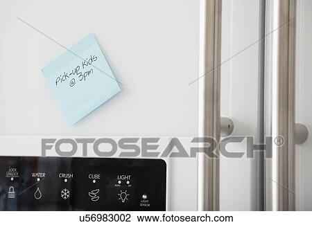USA, Illinois, Metamora, Reminder card attached to fridge door View Large Photo Image Stock Image - USA, Illinois, Metamora, Reminder card attached to fridge door. Fotosearch
