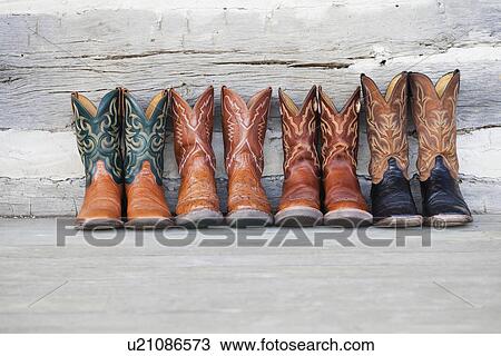 USA, Illinois, Metamora, Row of cowboy boots View Large Photo Image Stock Image - USA, Illinois, Metamora, Row of cowboy boots. Fotosearch