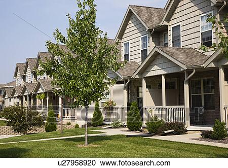 Stock Image - USA, Illinois, Metamora, Row of suburban houses. Fotosearch