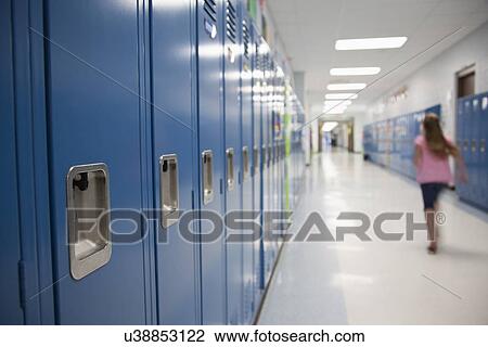 USA, Illinois, Metamora, Schoolgirl (8-9) walking in school corridor View Large Photo Image Stock Image - USA, Illinois, Metamora, Schoolgirl (8-9) walking in school corridor. Fotosearch