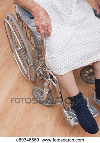USA, Illinois, Metamora, Senior man sitting on wheelchair, low section View Large Photo Image Stock Image - USA, Illinois, Metamora, Senior man sitting on wheelchair, low section. Fotosearch