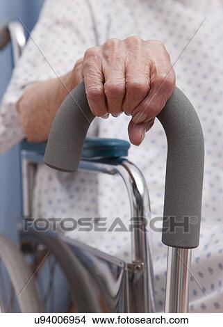 USA, Illinois, Metamora, Senior woman's hand on walking cane View Large Photo Image Picture - USA, Illinois, Metamora, Senior woman's hand on walking cane. Fotosearch