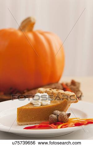 Stock Photograph - USA, Illinois, Metamora, Slice of pumpkin pie. Fotosearch
