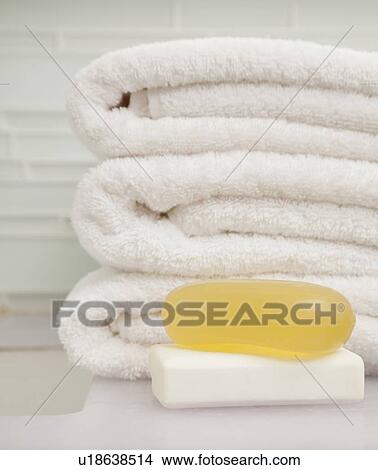USA, Illinois, Metamora, stack of towels and soaps in bathroom View Large Photo Image Picture - USA, Illinois, Metamora, stack of towels and soaps in bathroom. Fotosearch