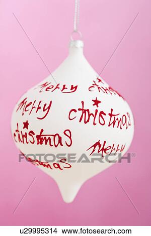 Picture - USA, Illinois, Metamora, Studio shot of single Christmas ornament. Fotosearch