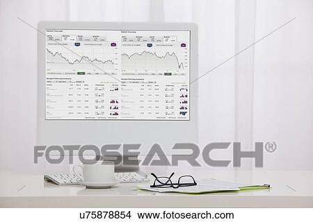 Picture - USA, Illinois, Metamora, Studio shot of computer displaying graphs. Fotosearch